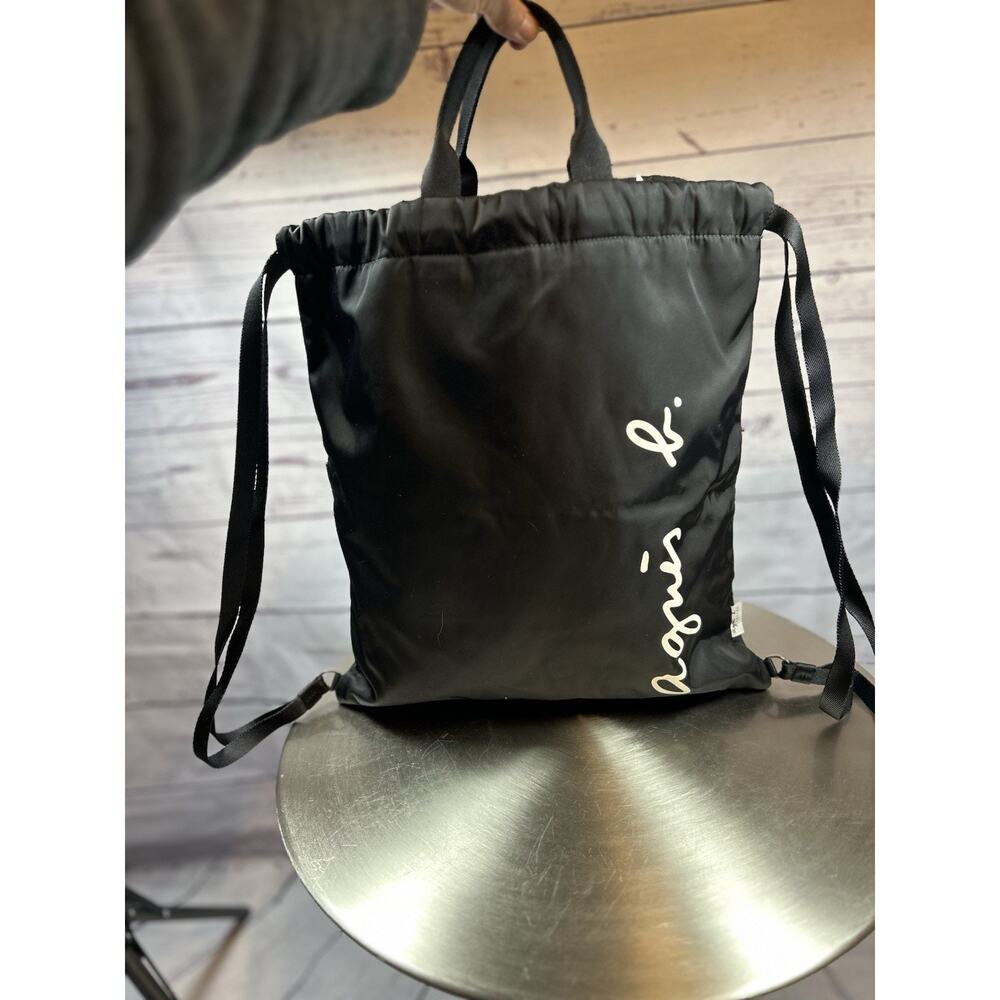 Agnes B Black Nylon Drawstring Backpack with Front Zipper Pocket